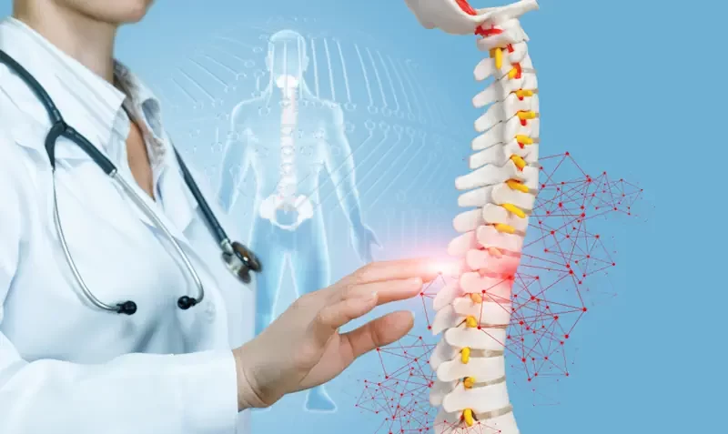 A doctor explaining a spinal cord injury for a total and permanent disability claim
